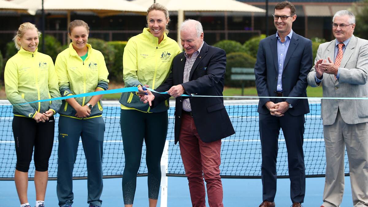 Winner: Lord Mayor Gordon Bradbury and Alicia Molik open the resurfaced courts at Wollongong Tennis Club on Tuesday. Picture: Tennis Australia.