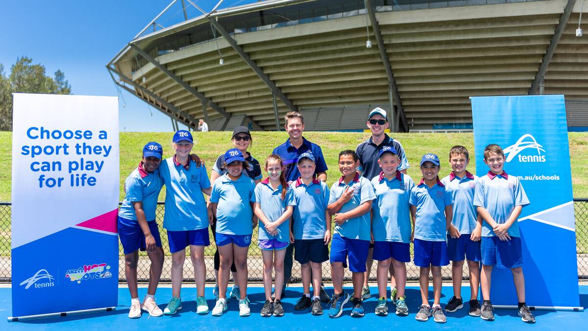 Hot shots: Students from Tarrawanna Public School with Todd Woodbridge at the finals of the Woodbridge Cup. Picture: Tennis Australia.