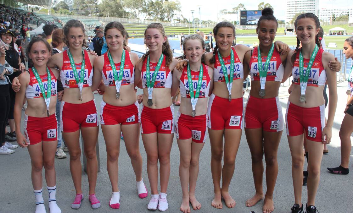 Medalists: The silver medal winning under 13 girls (Left) and under 12 girls 4x100m relay teams. Picture: Tim Crinnion.