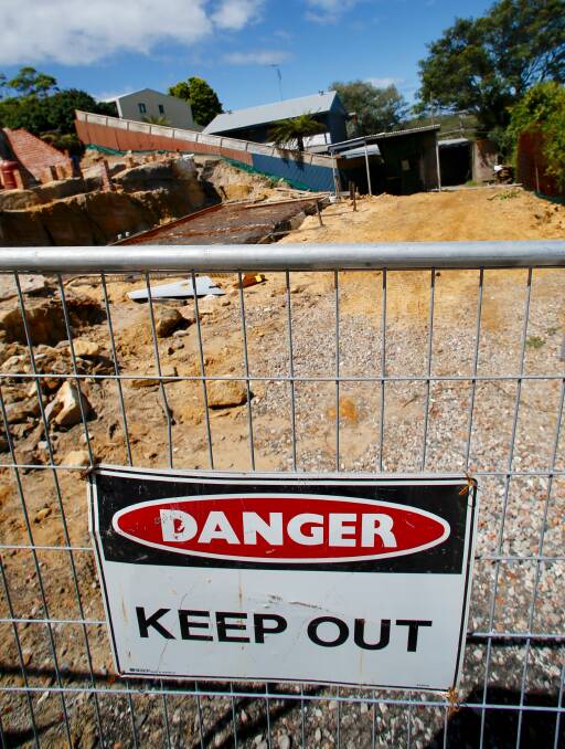 Works stopped: The developer has agreed to stop all works at the Parkes Street site until soil testing is complete. Picture: Adam McLean.