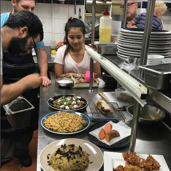 Shared experience: Eat At Sandy's co owner and chef Yon Miller works with Su Su to craft the menu for Monday night's communal feast. Picture: Instagram.