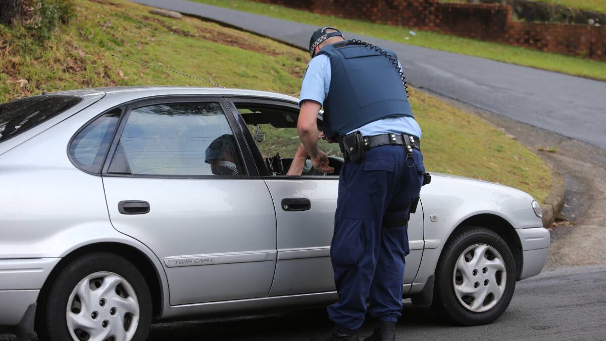 Police were checking drivers licences for residents to enter Stephen Drive, Joseph Street and Joanne Street. Picture: Robert Peet.