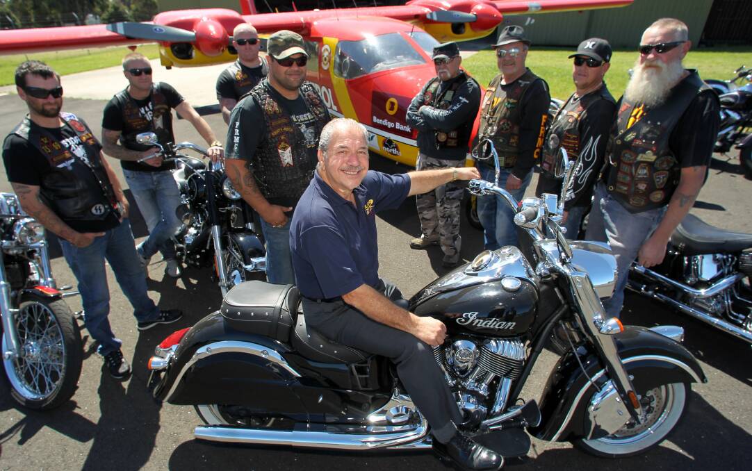 Fundraiser: Mr Mitchell and members of the Fourth Reich Motorcycle Club promoted the bike and tattoo show, which raised funds for the patrol in 2014. Picture: Greg Totman