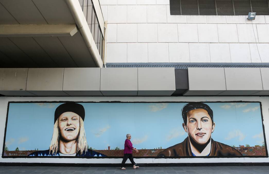 Art in public: Developer GPT has used temporary murals as part of its renovation project in Crown Street Mall. Picture: Adam McLean.