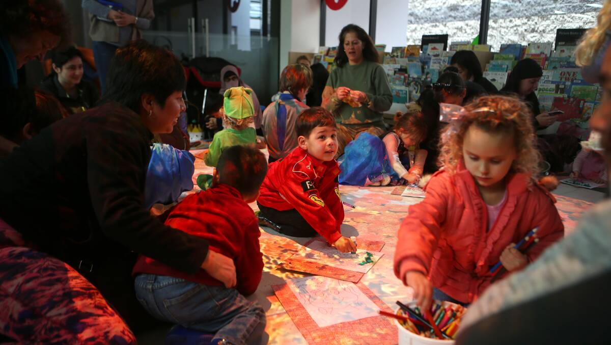 Kids and parents take part in Toddler TImes - one of the many weekly activities run at Wollongong's libraries.