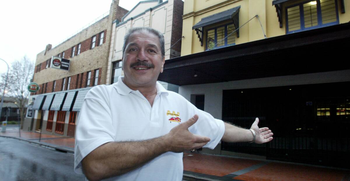 Man about town: Mr Mitchell said the CBD was his domain growing up, when he worked in his parents' Atlanta Milk Bar on Keira Street. Picture: Robert Peet, 2003.