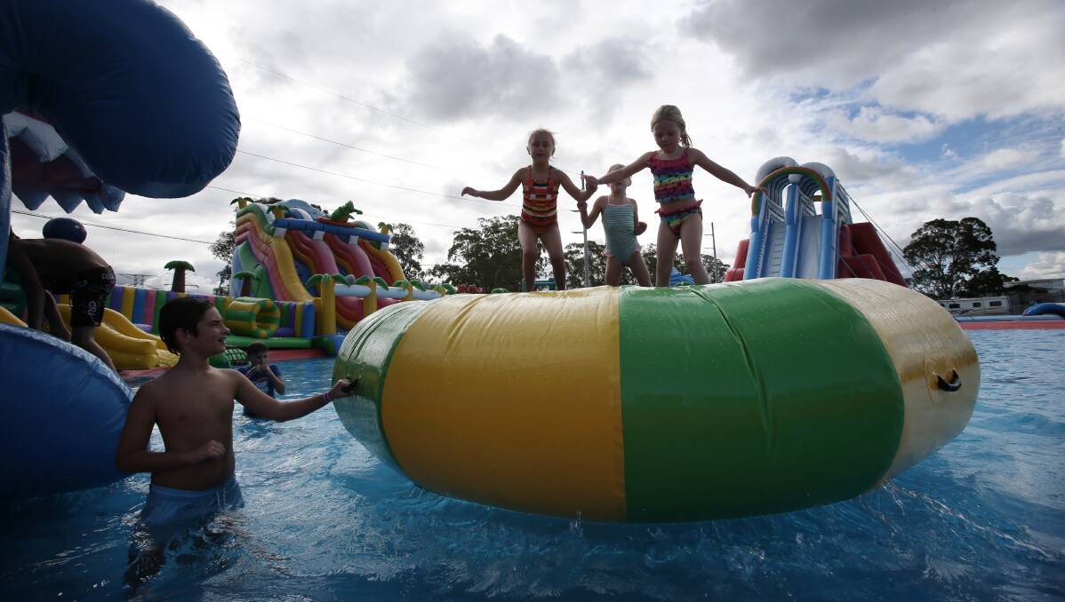 Inflatable water park plans: Wollongong council is considering plans for a temporary summer water park at Dapto showground, similar to this one in Liverpool.