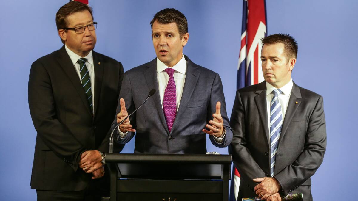 Premier Mike Baird, Deputy Premier Troy Grant and Minister for Local Government Paul Toole announce their proposals for Local Government late last year. Picture: Dallas Kilponen