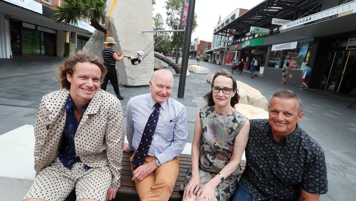 Artist Mike Hewson, Lord Mayor Gordon Bradbery, curator Barbara Flynn and councillor Leigh Colacino, with councillor Mithra Cox and her son in the background.