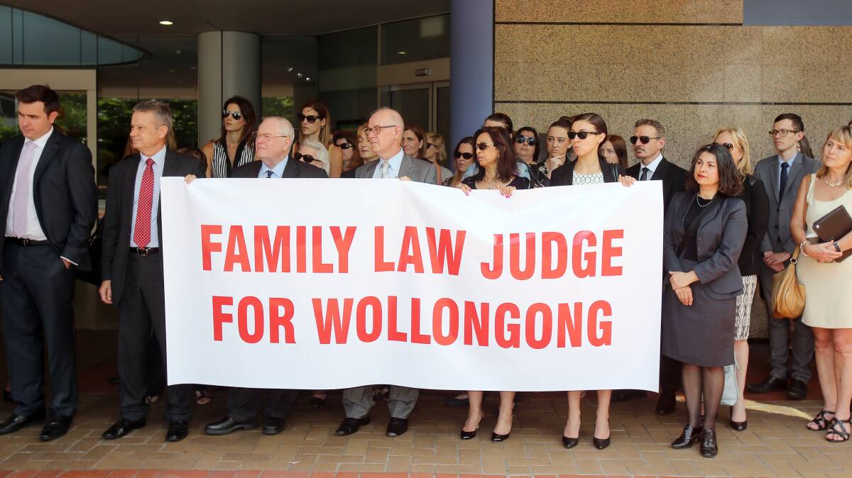 Up to 100 legal practitioners rallied outside Wollongong's family court registry in December to draw attention to the huge backlog of cases.