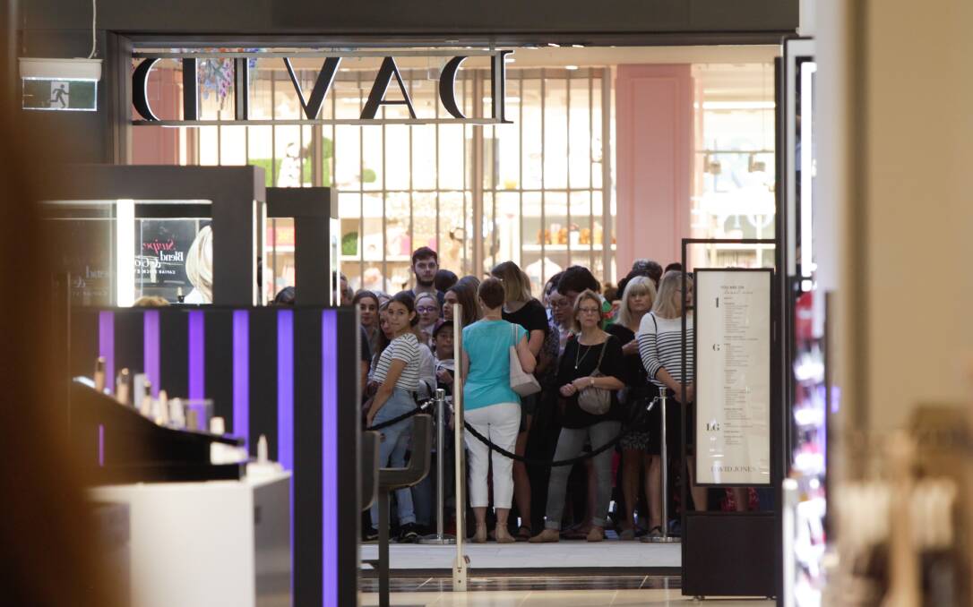 Clamouring for the first look: Shoppers queued for hours before the David Jones opening.