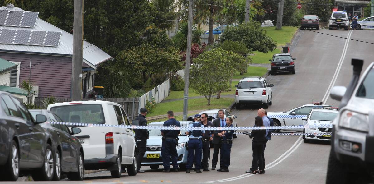 Suburban crime: Mountain Street was cordoned off and a white van taken away for forensic investigations. Picture: Robert Peet.