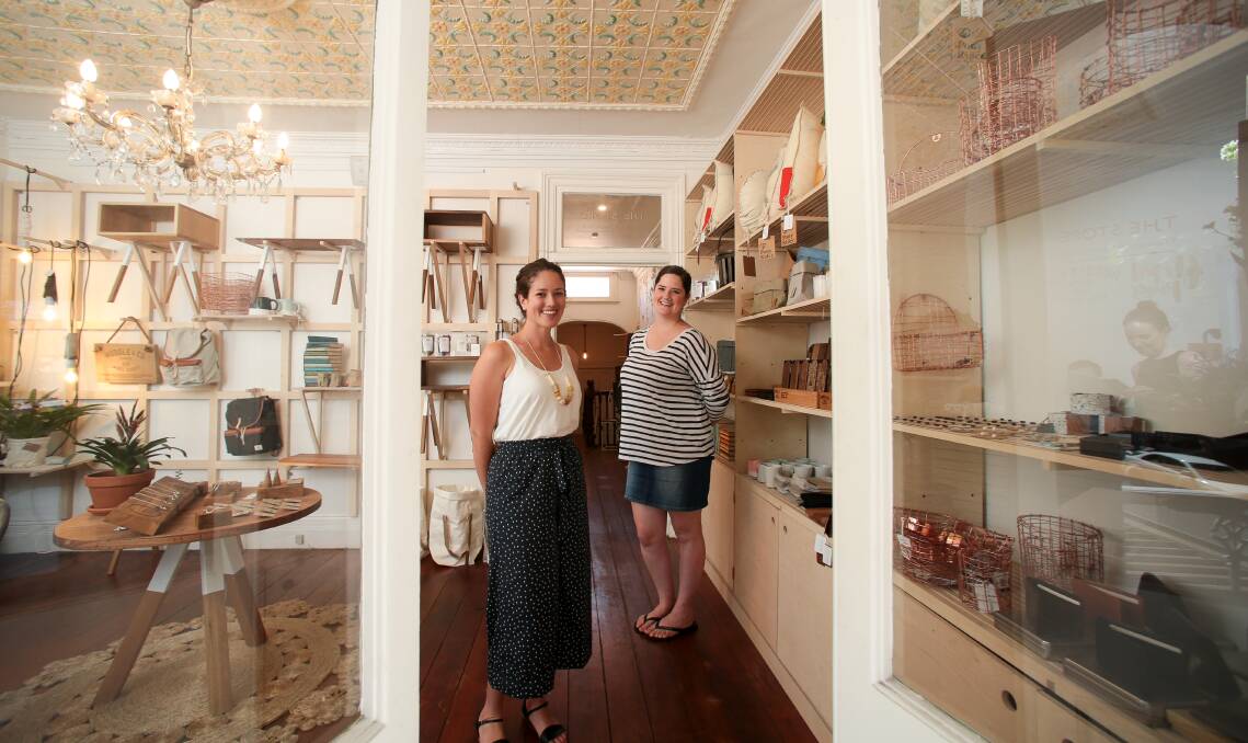 Flowers and furniture: Huddle & Co's Chrisy Wong and Floral Pines' Bek Town inside The Store, which has recently opened above Crown Street cafe Lee and Me. Pictures: Adam McLean.