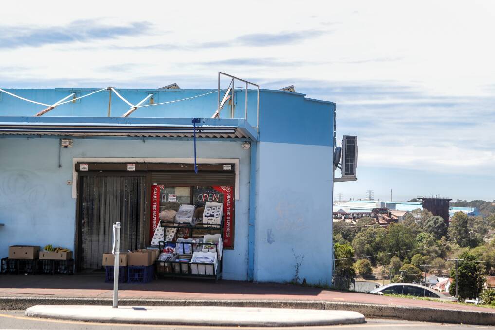 Steel influence: The paint on this Cringila store perfectly matches BlueScope, in the background.
