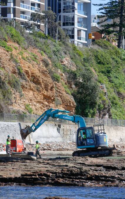 Pool works: Along with the early work on digging the trench along the Tramway seawall, contractors are repairing the Gentlemen's Baths. Picture: Adam McLean.