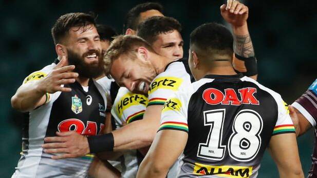 Strong finish: Bryce Cartwright is mobbed after scoring. Photo: AAP