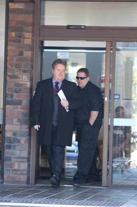 'Not guilty': Lee Griffin (right) leaves Port Kembla Local Court on Wednesday with his lawyer Aaron Kernaghan.