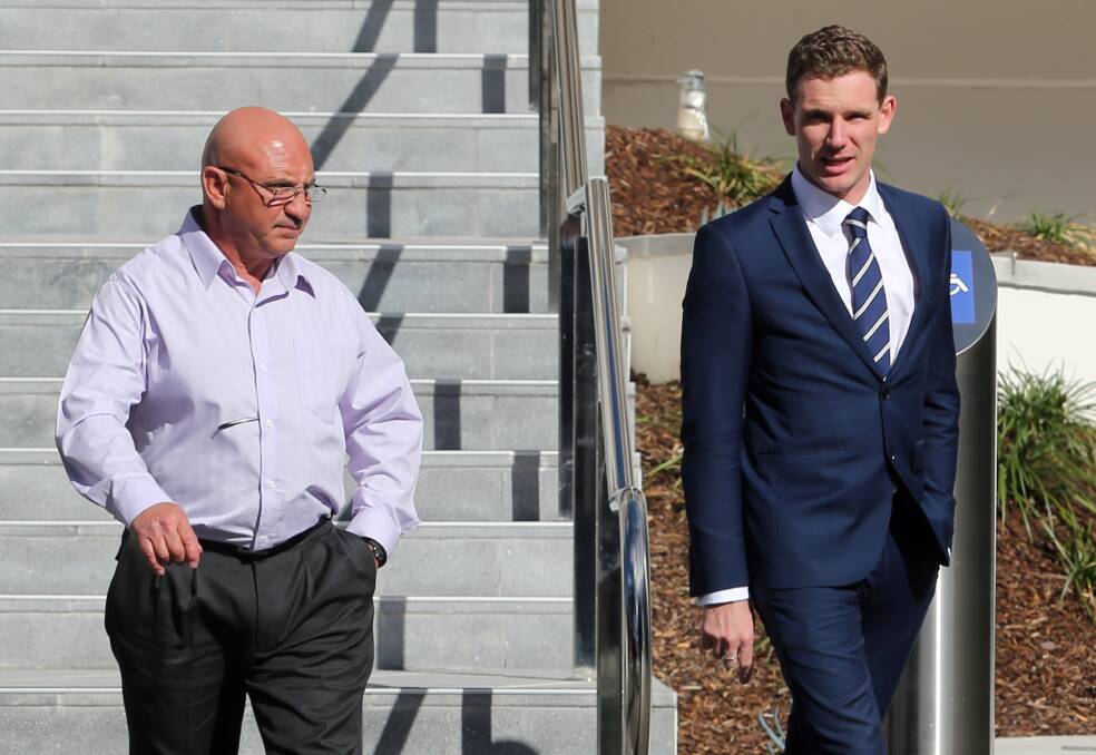 Defence: Peter Busuttil (left) leaves Wollongong courthouse with one of his lawyers, James Howell.