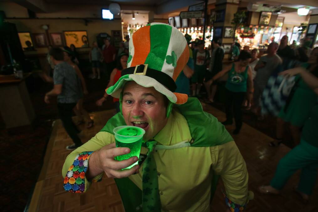 GREEN AT THE GILLS: Paul Cassidy getting into the spirit of St Patrick's Day with green beer at Dicey Riley's Wollongong. Picture: Adam McLean
