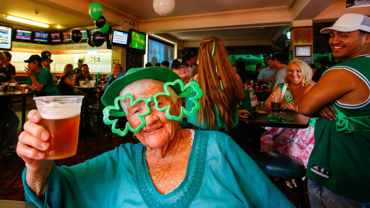 LUCK OF THE IRISH: Joyce Gormly celebrating the Irish national holiday with her daughter and cousins at Wollongong's only Irish pub. Picture: Adam McLean