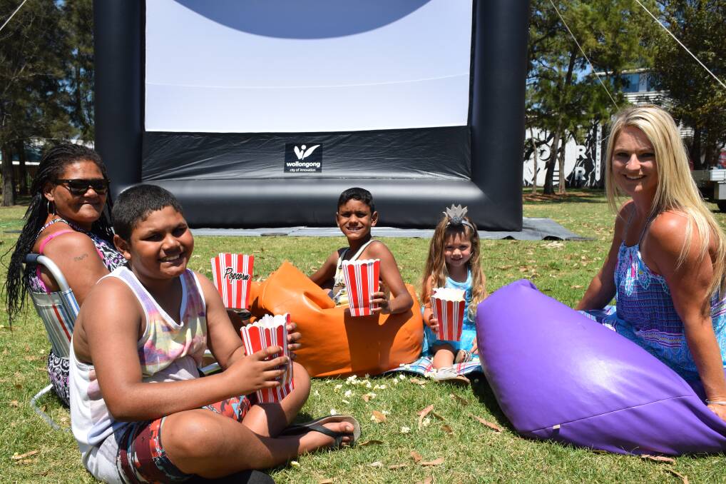 The Donovan and Emek families get ready for free summer movies. Picture: Supplied