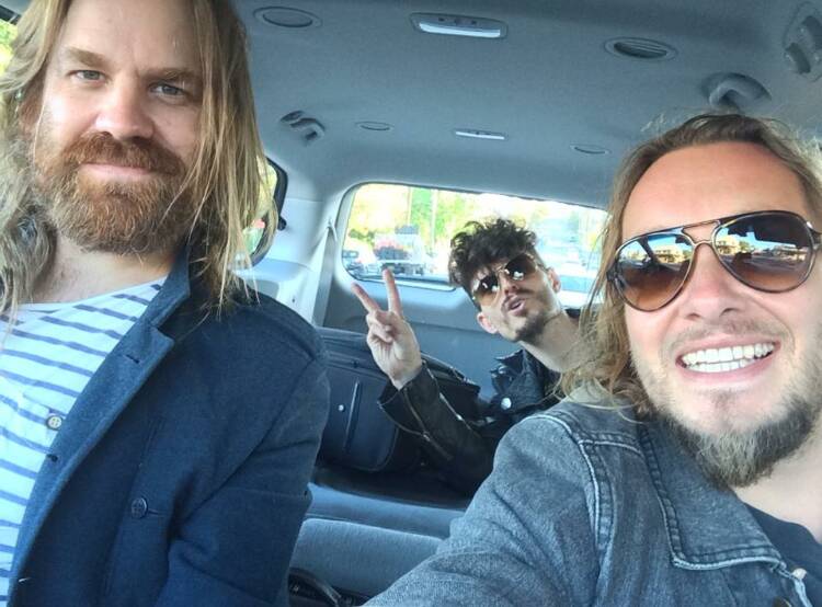 TRAGIC: Road tripping before the tour accident that left their drummer in intensive care and killed their production manager - Phil Stack, Rai Thistlewaite and Matt Smith from Thirsty Merc. Picture: Supplied