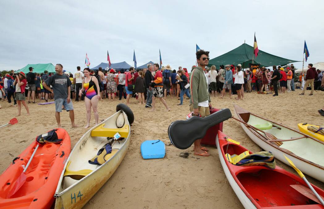 ENVIRONMENTALIST: Ash Grunwald protested against coal seem gas mining with other high-profile musicians at Newcastle's Horseshoe Beach in early May. Picture: Max Mason-Hubers