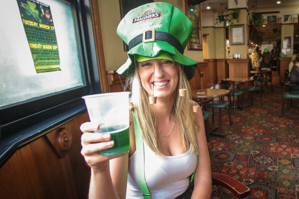 LEPRECHAUN: Kirralee Dempster mixing Australian and Irish traditions with her head attire and having a great time doing it. Picture: Adam McLean