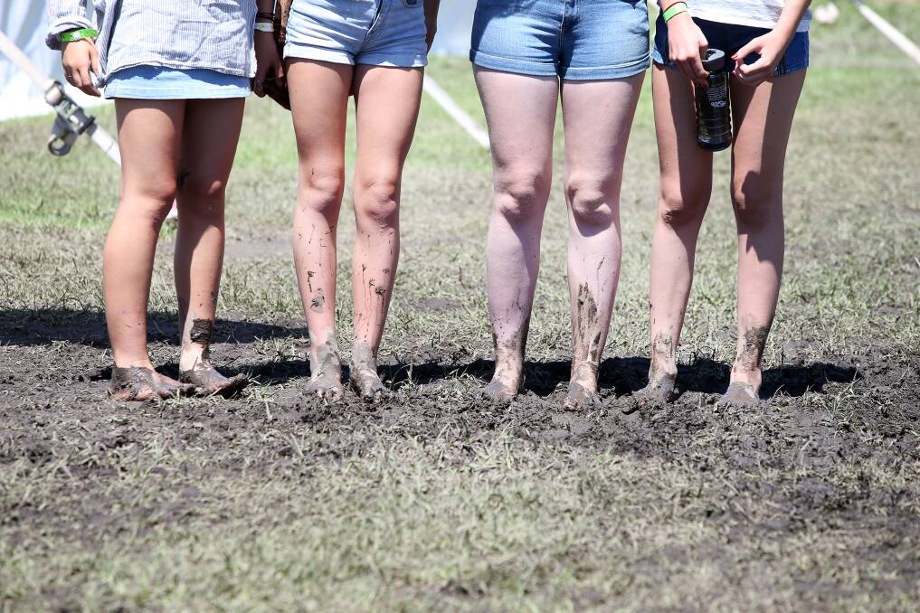 The inevitable mud throughout the grounds added to the festival vibe, with most revelers unfazed by the ankle deep muck.