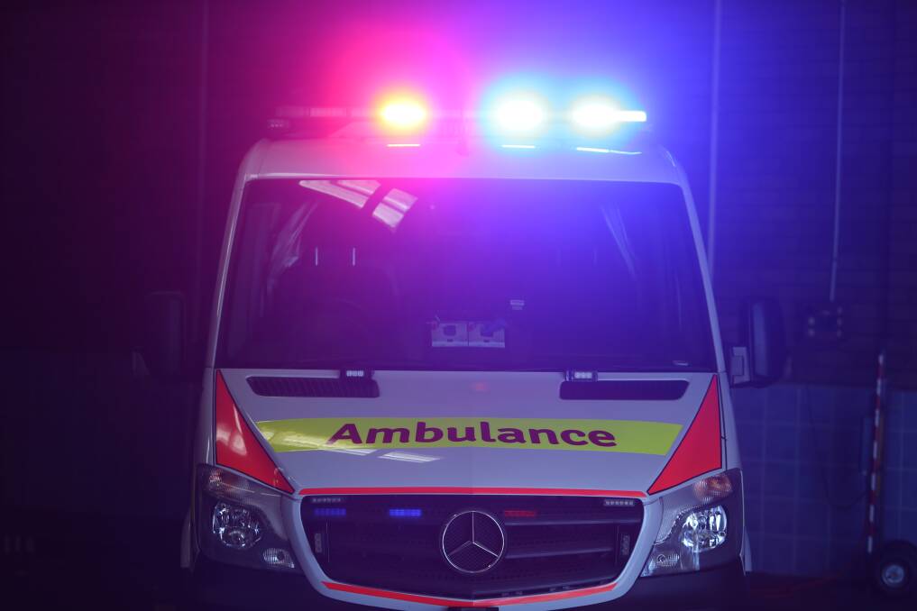 Motorcycle in flames after serious crash in Unanderra