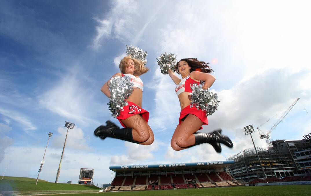Fairfax file picture of Lauren Chikitch and Alex McKeon, Dragons cheerleaders. Picture: Sylvia Liber