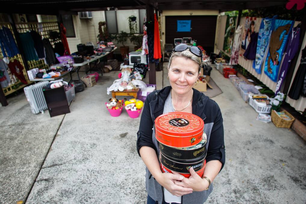 Cindy Burton-Woods says many of the bargain-hunters wandering through her Balgownie garage sale had specific items they were searching for like power tools or vintage records. Picture: Georgia Matts