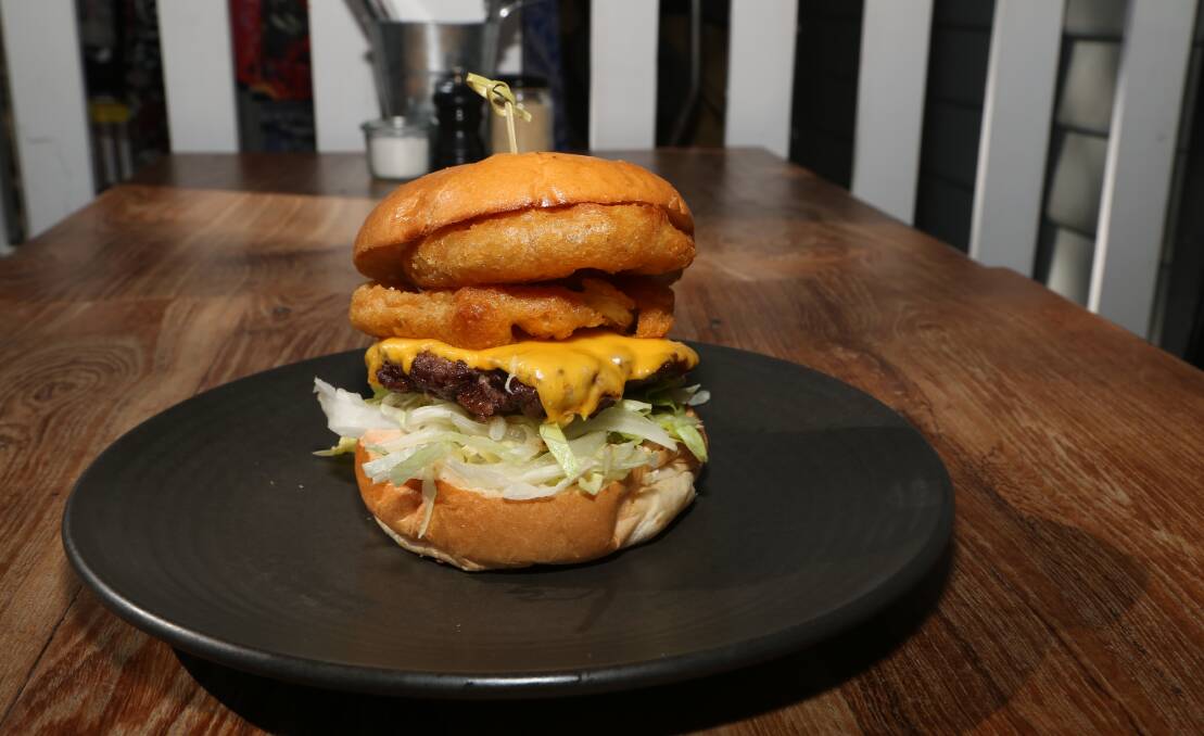 Naughty and nice: Meet the popular Bad Boy burger which is some see as a challenge -  at The Hungry Monkey in Kiama. Picture: Greg Ellis.