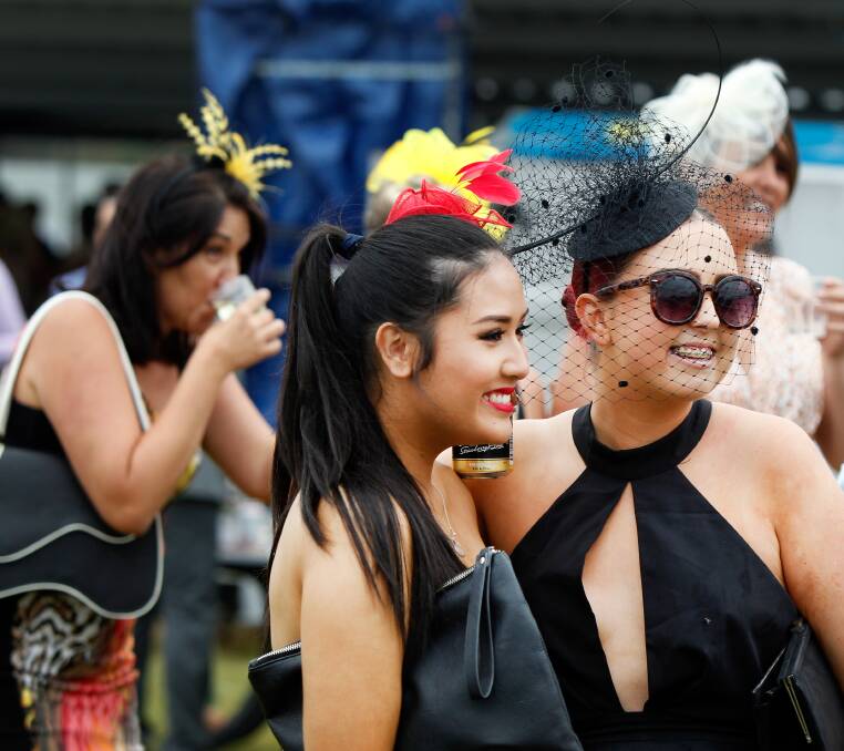 CANDID: Netting and bold colours are big track-side this year. Millinery experts say it's about individual style and wearing something with confidence. Picture: Sylvia Liber