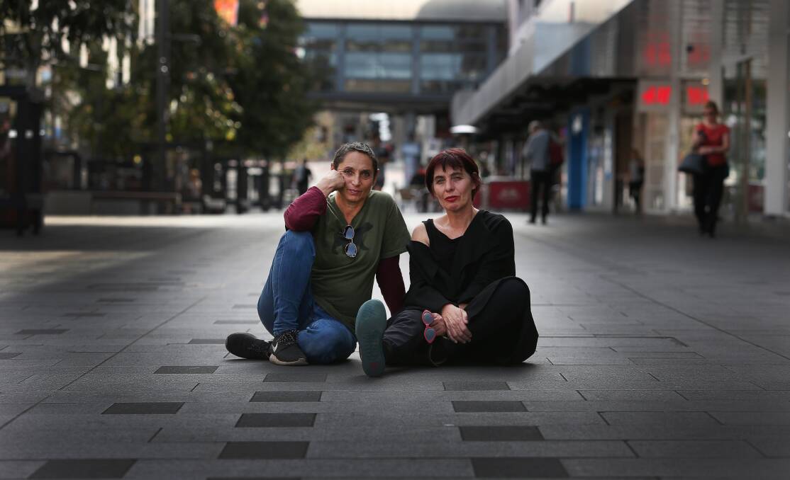 HEARTBROKEN: Jenny Briscoe-Hough and Lara Seresin say they were 'stunned' to lose their bid to operate the Friday markets in Crown Street Mall. Meantime 1700 people have signed a petition calling on council to reverse their decision. Picture: Robert Peet