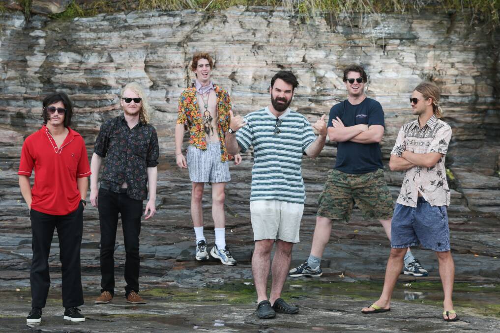 SHINING BIRD: Nathan Stratton, Ricci Quirke, Alistair Webster, Dane Taylor, Russell Webster and James Kates at Austinmer beach. Picture: Adam McLean