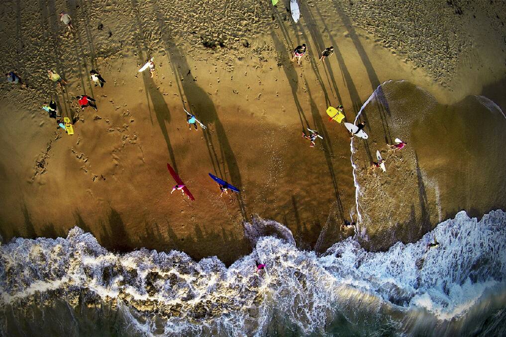 Early Morning Surfers #1: Surf school at Woonona about to paddle out. Chris Duczynski's aerial shots are currently on exhibition at The Beanstalk Cafe in Thirroul.