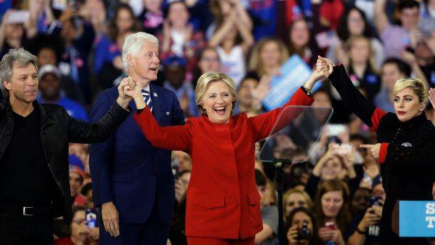 Final stop: Hillary Clinton is joined by Jon Bon Jovi, left, Lady Gaga, right and former President Bill Clinton during a late-night campaign rally at North Carolina State University. Photo: AP