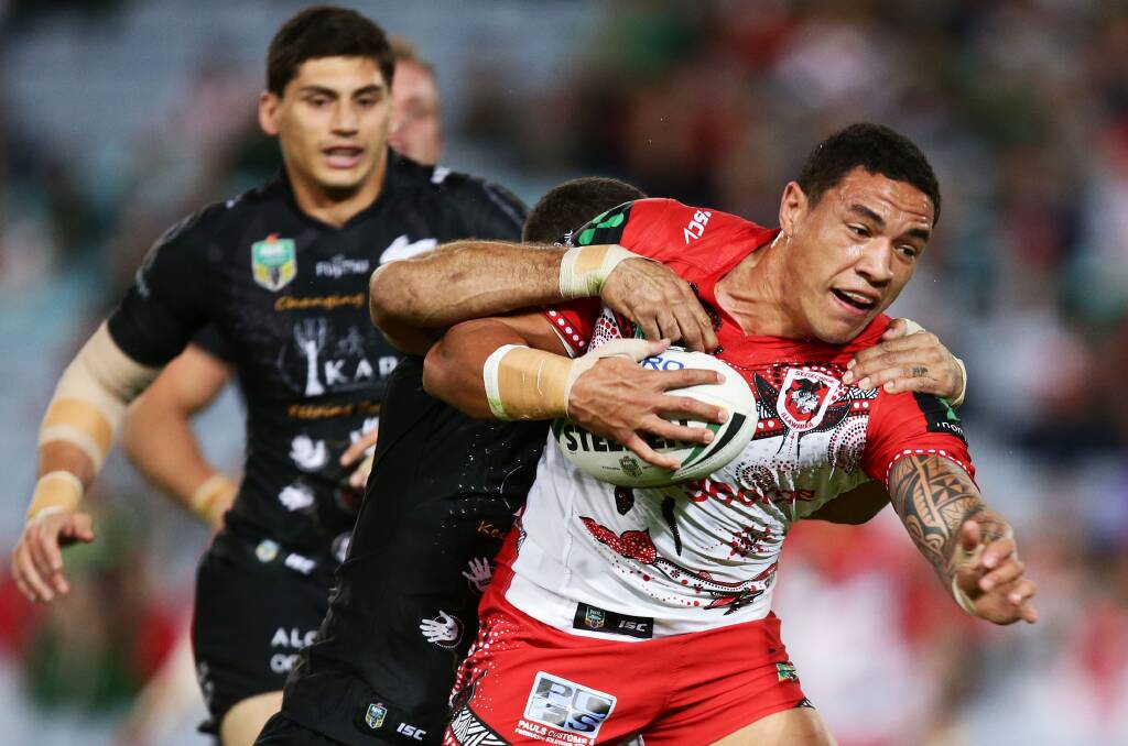DOWNED: Tyson Frizell wrestles with the Rabbitohs defence in the Dragons 34-24 loss at ANZ Stadium on Thursday. Picture: Getty Images
