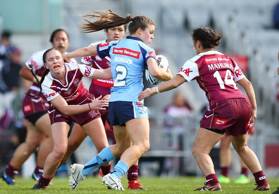 STAR TURN: NSW Debutant Jessica Stergis scored a hat-trick in the Blues victory over Queensland at WIN Stadium on Sunday. Picture: Getty Images