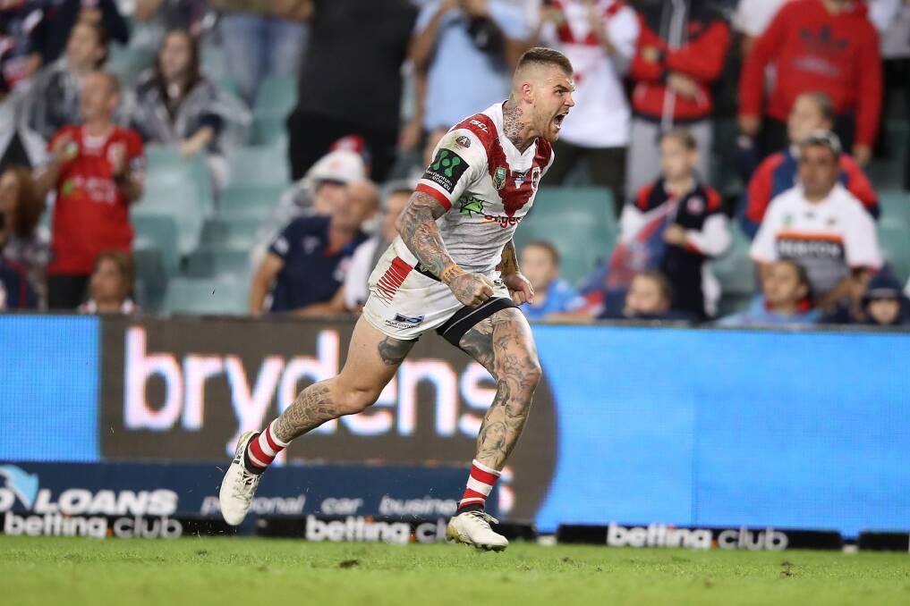 COMETH THE MAN: Josh Dugan celebrates after nailing the conversion that sent the Dragons Anzac Day clash with the Roosters into golden point. Picture: Getty Images