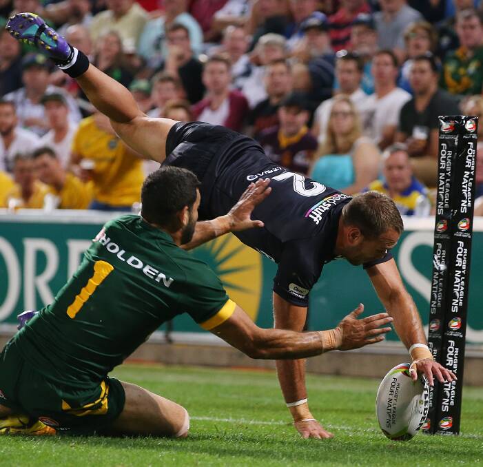 TRY TIME: New Zealand winger Jason Nightingale scores for the Kiwis in their 26-12 win over Australia in May's Trans-Tasman Test. New Zealand will fly to England for a three-Test series in November. Picture: Getty Images