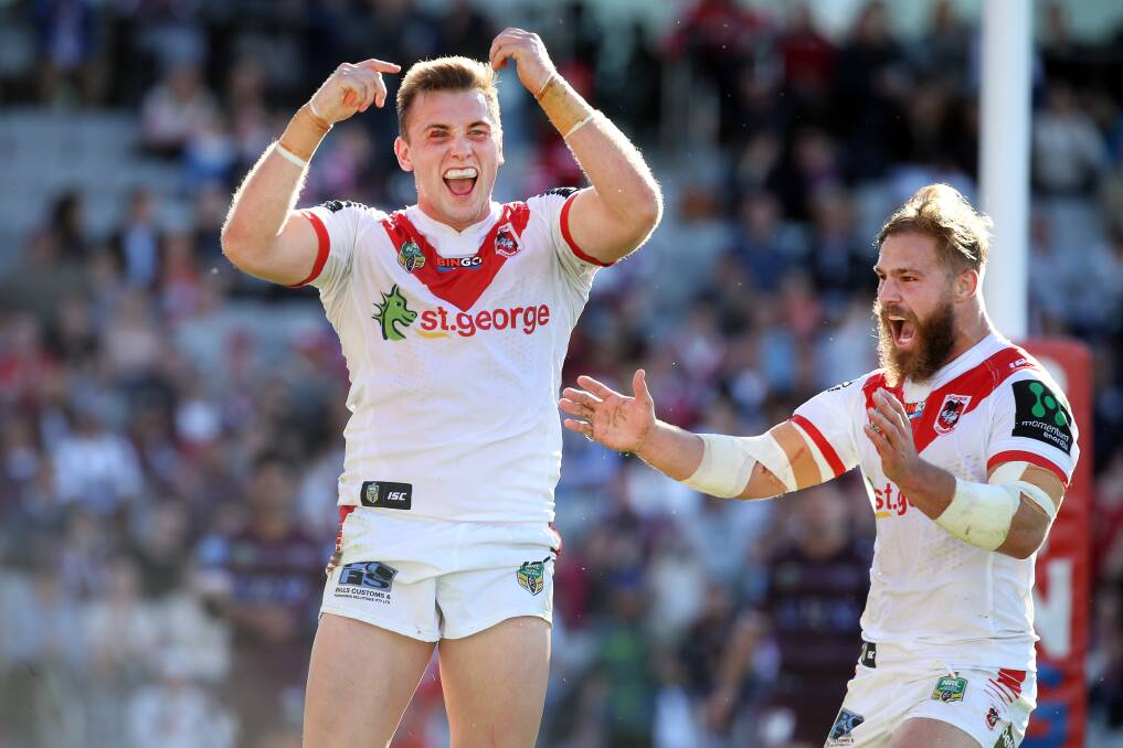 FOUR-POINTER: Jacob Host celebrates his first-half try in the Dragons 52-22 win over Manly on Sunday. Picture: Sylvia Liber