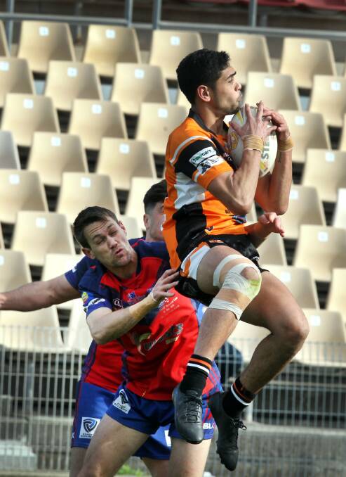 Tigers flyer Azan Turoa scored a hat-trick for Helensburgh on Saturday