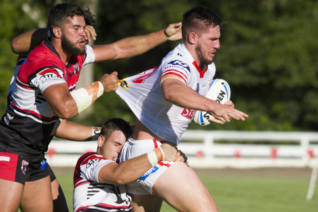 TOUGH STUFF: Illawarra forward Chris Lewis wrestles with the North Sydney defence in the Steelers' loss to the Bears on Saturday. Picture: Blake Edwards