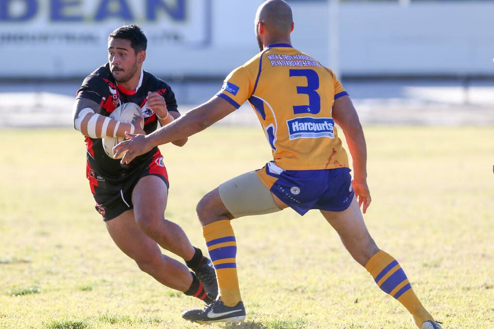 ON THE ATTACK: Collegians winger Donte Efaraimo takes on the defence in the Dogs 22-20 win over Dapto on Saturday. Picture: Adam McLean