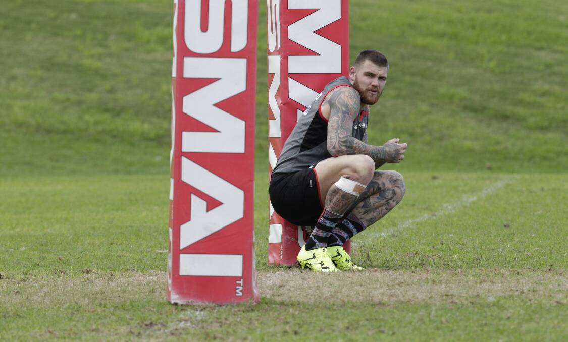 BATTERED: Dragons fullback Josh Dugan has revealed just how big a toll a gruelling 2015 season took on his body. Picture: Andy Zakeli
