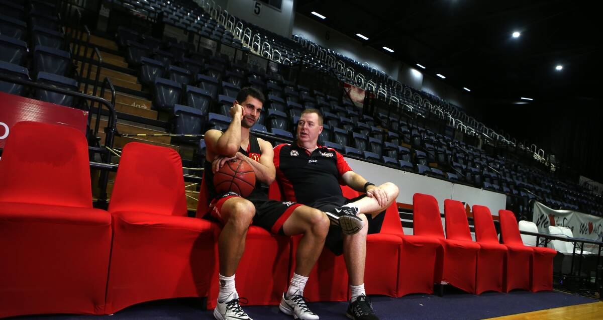 TOUGH CALL: Kevin Lisch choked up when telling long-time mentor Rob Beveridge of his decision to leave the Hawks and link with the Kings next season. Picture: Sylvia Liber