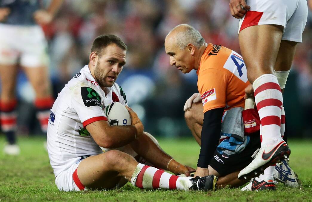 LEGITIMATE: Jason Nightingale is seen to after being the victim of a crusher tackle during the Dragons v Roosters Anzac Day clash. Picture: Getty Images