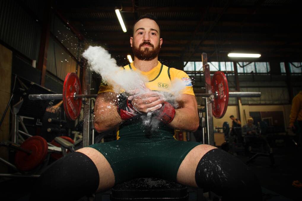 STRENGTH TEST: Wollongong powerlifter Joey Zinghini - pictured at his Strength Lab gym in Wollongong - ahead of the the IPF world championships. Picture: Georgia Matts